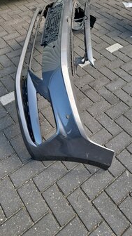 VW Polo 2G Voorbumper nieuw 4x pdc gaten grijs