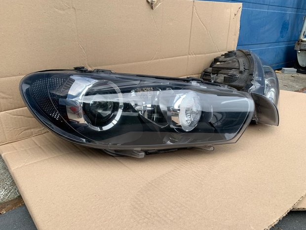 VW Scirocco Bi-Xenon Koplamp rechts links 1K8941031F 32F